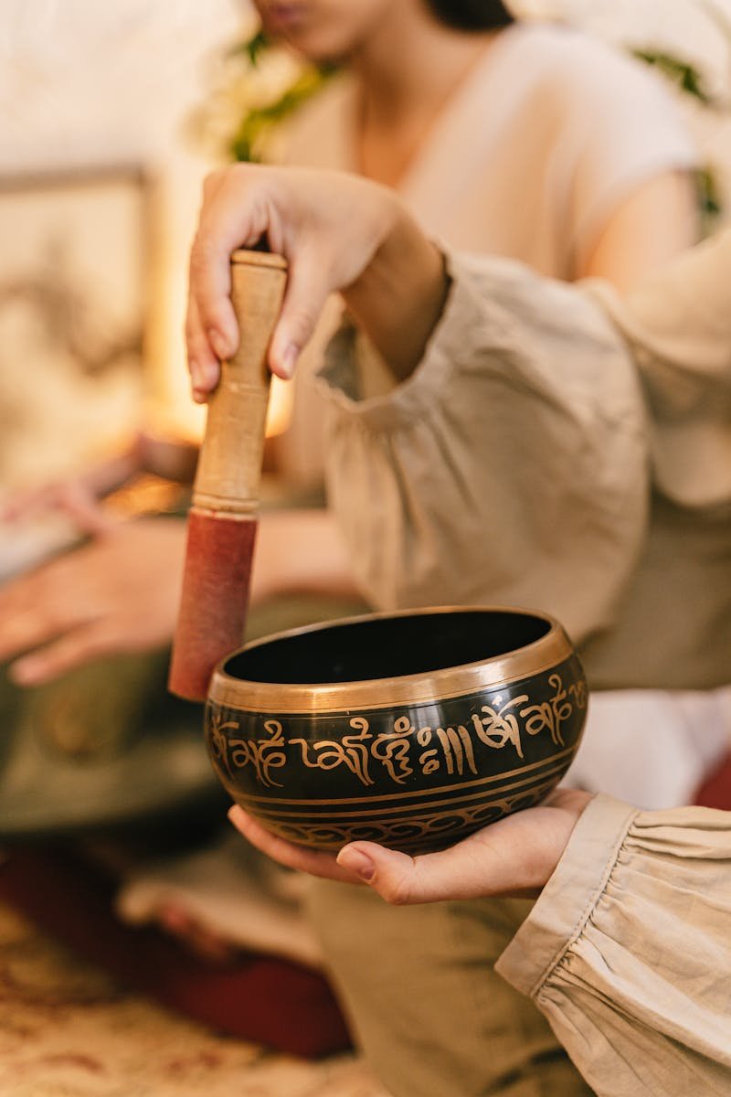 Peaceful atmosphere with a Tibetan singing bowl, promoting relaxation and mindfulness.
