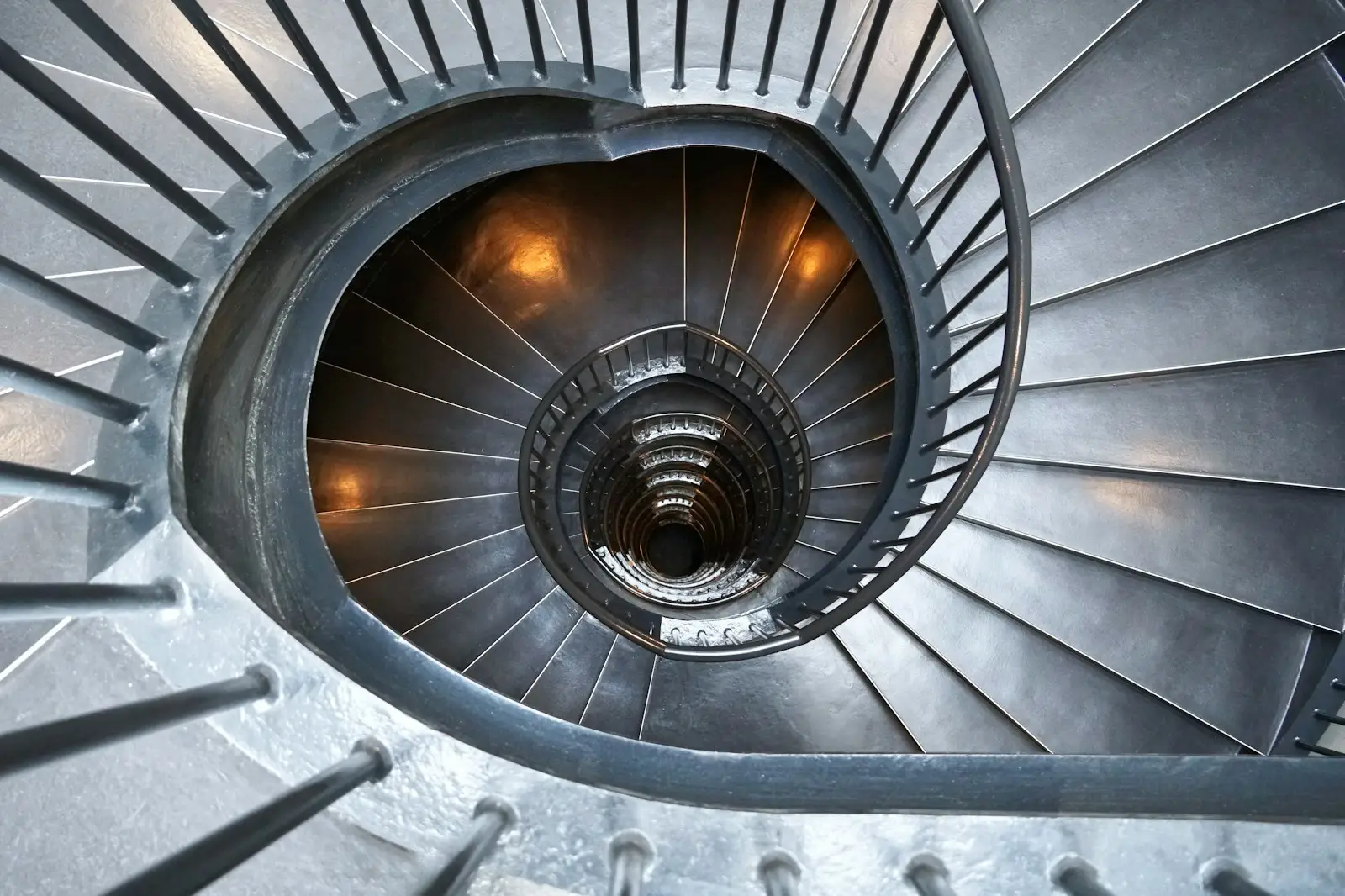 gray concrete spiral stairs with no people, hypnose, conscience, inconscience